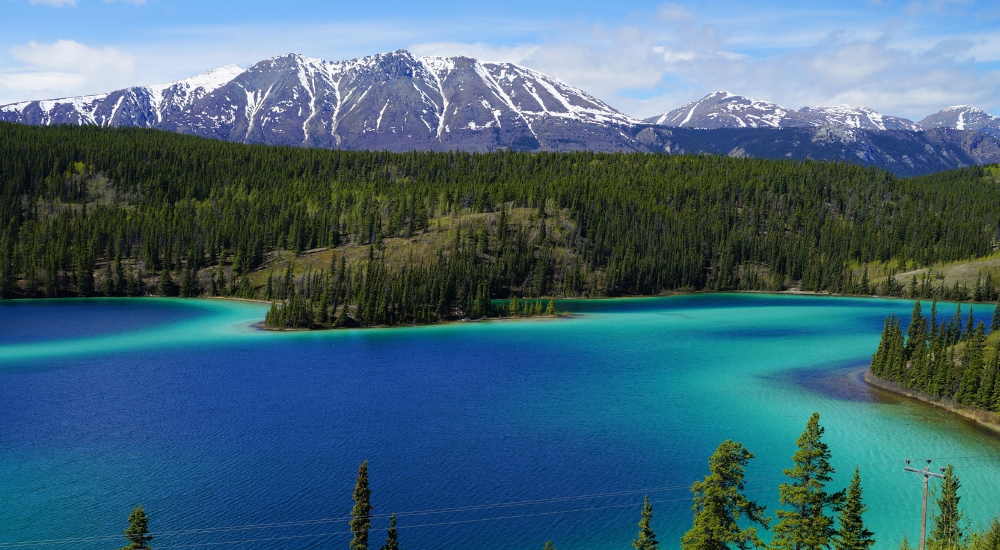 Emerald Lake, situated in the Yukon enroute between Whitehorse and Skagway